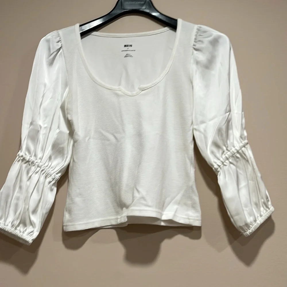 Anthropologie chic cream
