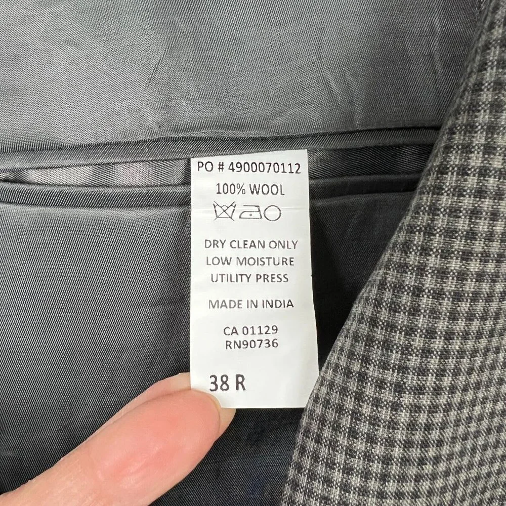 Calvin Klein wool holes office