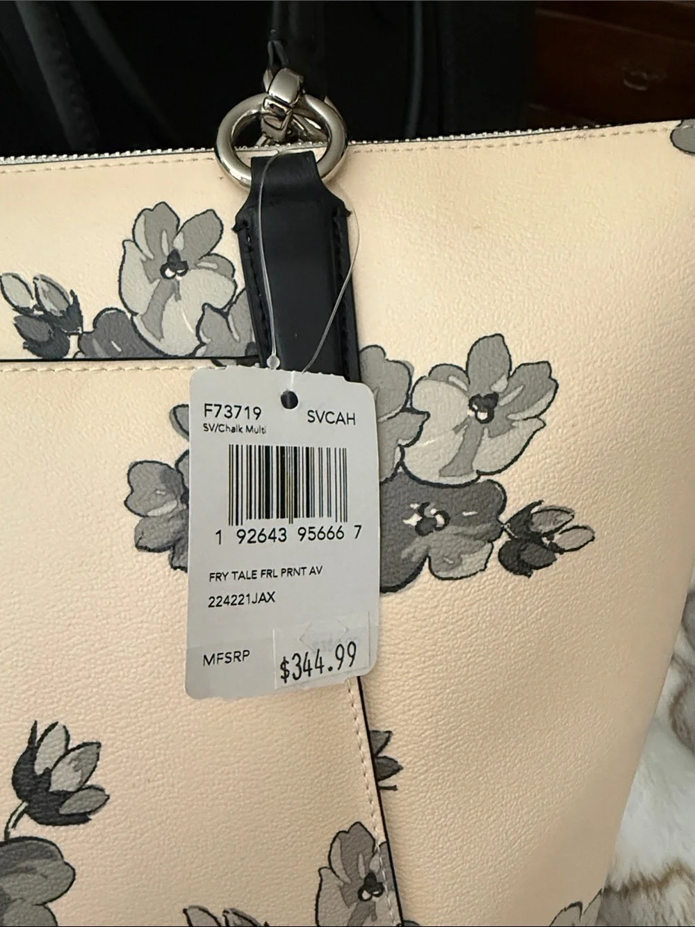 Coach tote featuring