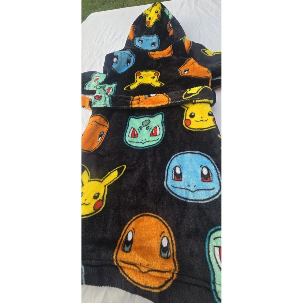 Pokemon hooded character ground