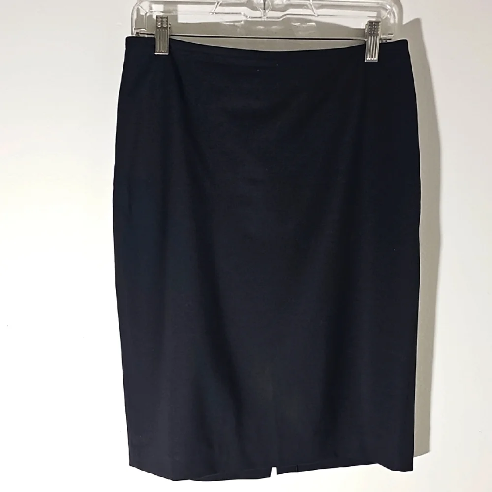 Talbots Black Pencil Skirt. Size 8. Rear Zipper. 87% Wool‎ 9%nylon 4% Spandex