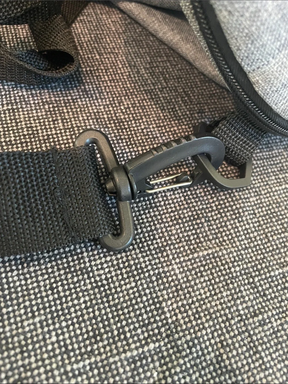 Northwest Gray Duffel Bag with Black Straps and Raiders Logo