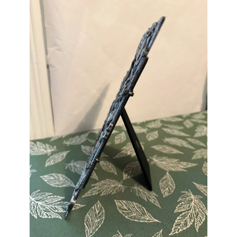 Unbranded ornate pewter