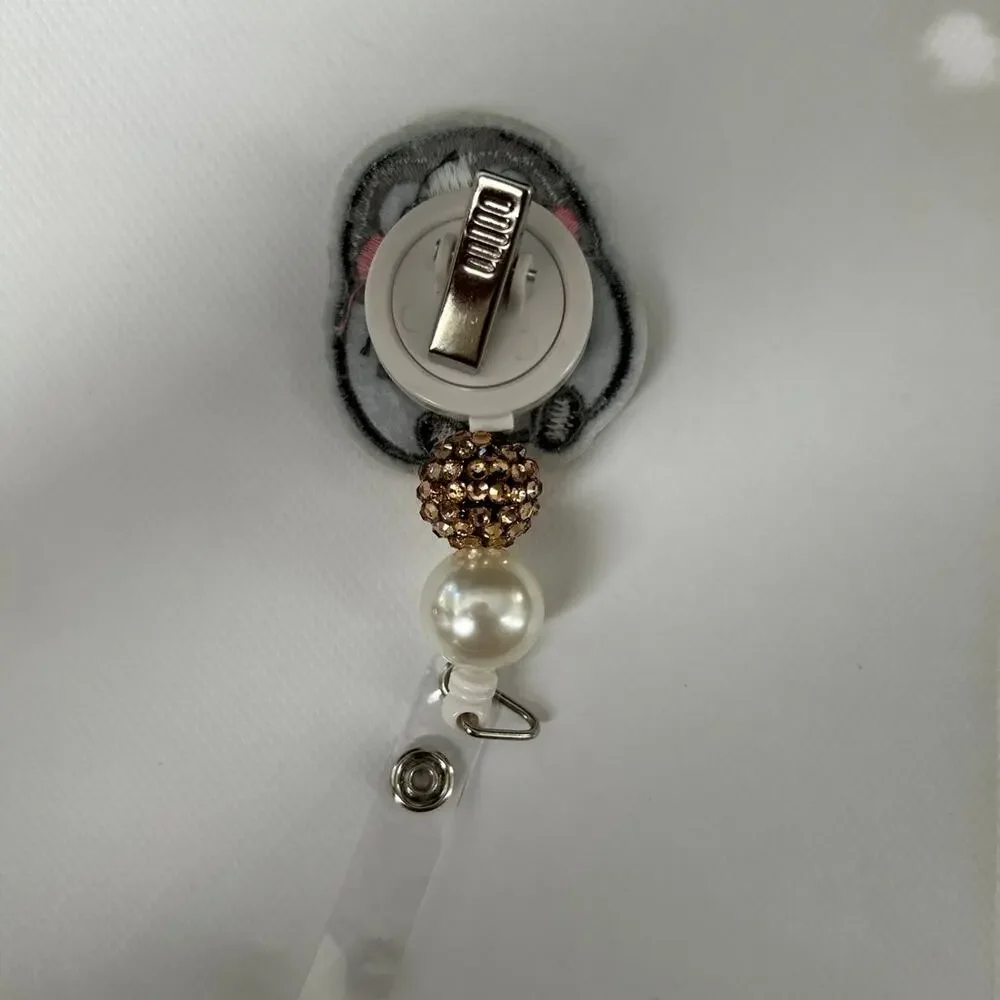 Penguin Badge Reel